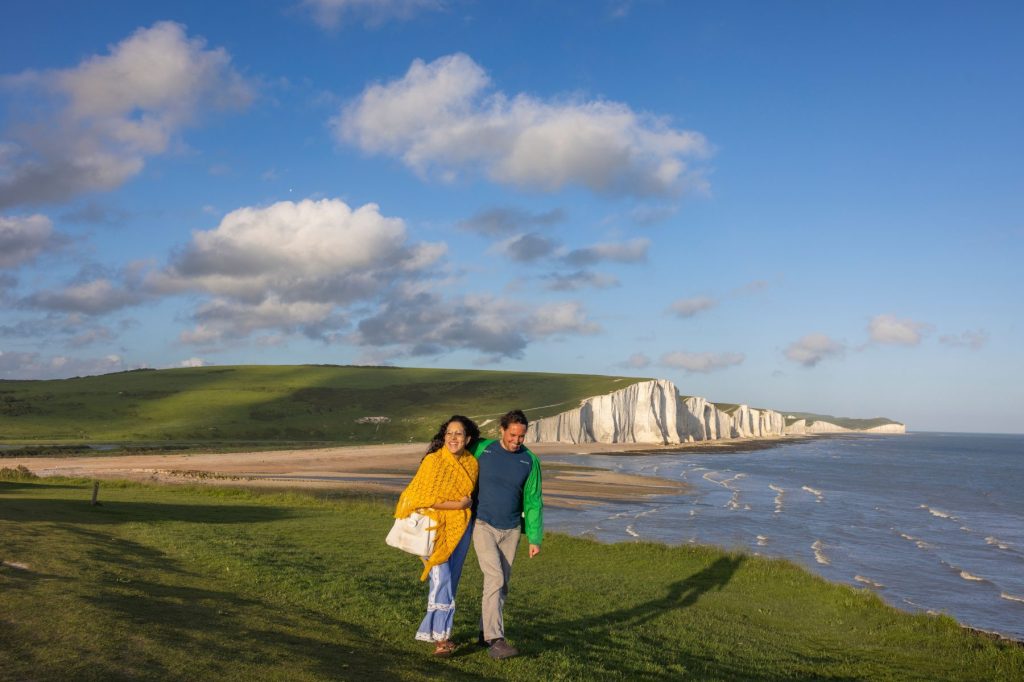 Seven Sisters view with 2 people walking